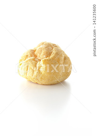 A cream puff photographed alone against a white background. A cream puff photographed alone against a white background. 141235600