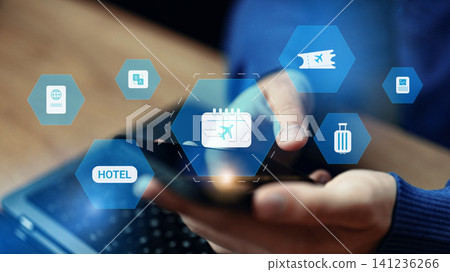 Using a smartphone for travel booking and planning with various travel icons and symbols displayed on the screen Using a smartphone for travel booking and planning with various travel icons and symbols displayed on the screen 141236266
