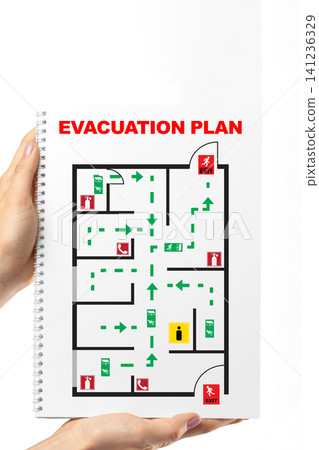 Evacuation plan showing emergency routes and exits in a building layout for safety instructions Evacuation plan showing emergency routes and exits in a building layout for safety instructions 141236329