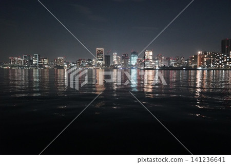 A night view of Tokyo Tower and the Minato Ward/waterfront area from Toyosu Gururi Park. A night view of Tokyo Tower and the Minato Ward/waterfront area from Toyosu Gururi Park. 141236641