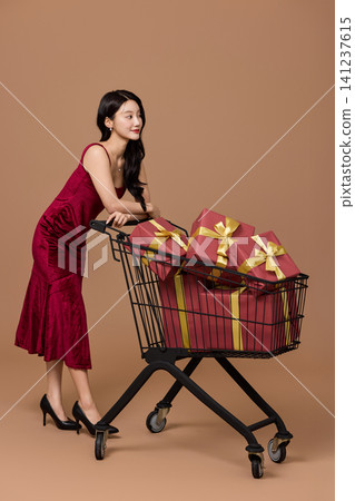 Holiday sale concept with a cart full of presents Holiday sale concept with a cart full of presents 141237615