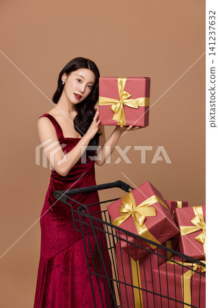 Holiday sale concept with a cart full of presents 141237632
