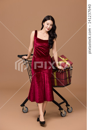 Holiday sale concept with a cart full of presents 141237640