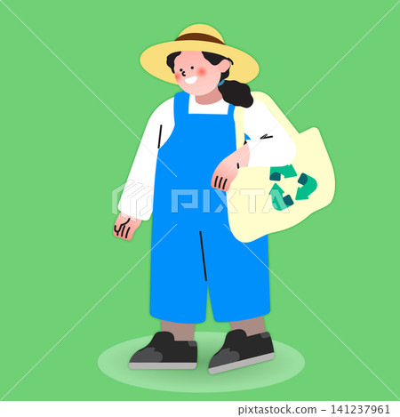 A woman smiles while holding a bag with a recycling symbol. She wears blue overalls and a hat. The background is a solid green color. 141237961