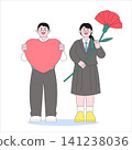Two students stand together at a school event in spring. One holds a large heart shape while the other holds a flower. They smile and seem happy sharing this moment. 141238036