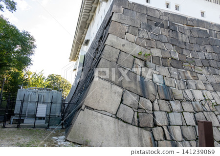 Osaka Castle: Bombing damage to the castle tower's stone walls. Osaka Castle: Bombing damage to the castle tower's stone walls. 141239069