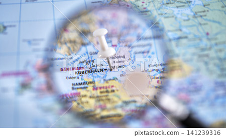 Map showing a marked location with a magnifying glass in Copenhagen Map showing a marked location with a magnifying glass in Copenhagen 141239316