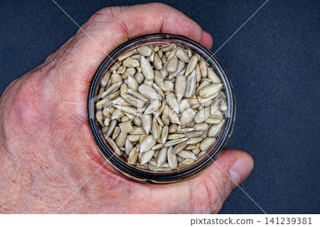 beautiful texture ripe of natural sunflower seeds on background beautiful texture ripe of natural sunflower seeds on background 141239381