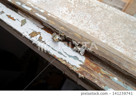 Old Wooden Window Frame with Partially Stripped Paint Old Wooden Window Frame with Partially Stripped Paint 141239741