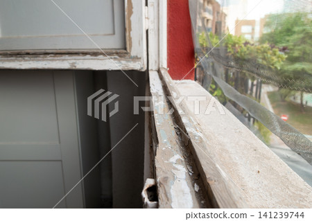 Old Wooden Window Frame with Partially Stripped Paint Old Wooden Window Frame with Partially Stripped Paint 141239744