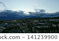 A town shrouded in clouds at autumn twilight. 141239900