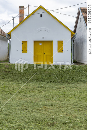 Traditional yellow and white wine cellar in Palkonya, Hungary Traditional yellow and white wine cellar in Palkonya, Hungary 141239993