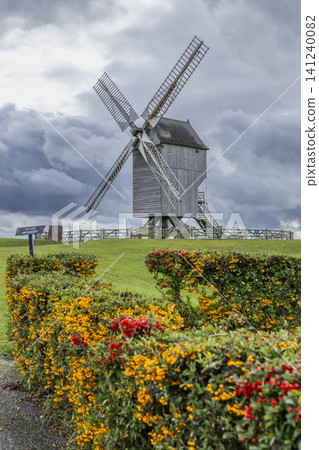 Valmy windmill standing on hill with berries, France Valmy windmill standing on hill with berries, France 141240082