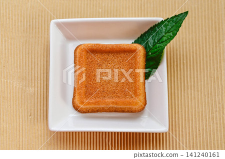 Financiers, a type of Western confectionery enjoyed during teatime. Financiers, a type of Western confectionery enjoyed during teatime. 141240161