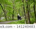 Scenes of the lush green forests and tourists in Kamikochi, a popular tourist spot in early summer. 141240483