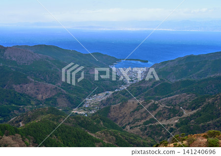 View of Toda Fishing Port and Suruga Bay from near Mt. Kodaruma on the Izu Mountain Ridge Trail of the Izu Peninsula. View of Toda Fishing Port and Suruga Bay from near Mt. Kodaruma on the Izu Mountain Ridge Trail of the Izu Peninsula. 141240696
