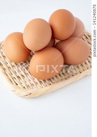 Red eggs placed on a sieve 141240878