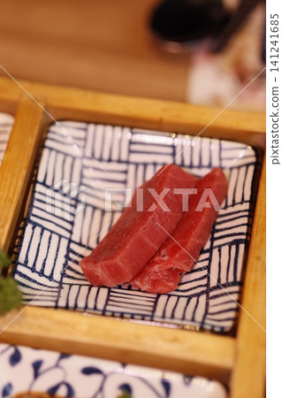 Fresh Slices of Raw Tuna on Traditional Plate Fresh Slices of Raw Tuna on Traditional Plate 141241685