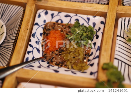 Japanese Dish with Toppings on Blue-White Plate Japanese Dish with Toppings on Blue-White Plate 141241691