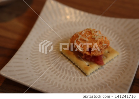 Cheese Dip with Crackers on White Plate Cheese Dip with Crackers on White Plate 141241716