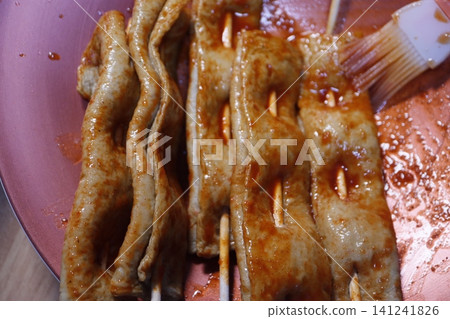 Grilled Skewered Food with Sauce Brush Grilled Skewered Food with Sauce Brush 141241826