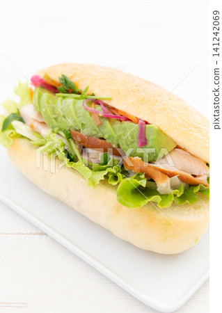 Delicious smoked chicken and avocado focaccia sandwich Delicious smoked chicken and avocado focaccia sandwich 141242069
