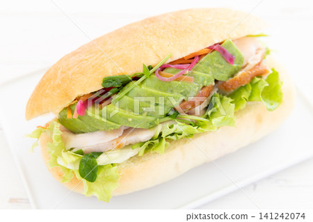 Delicious smoked chicken and avocado focaccia sandwich Delicious smoked chicken and avocado focaccia sandwich 141242074