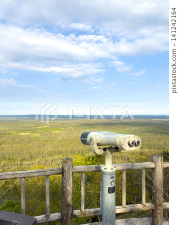 Binoculars overlooking the wetlands Binoculars overlooking the wetlands 141242164