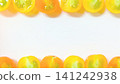 Frame of yellow and orange mini tomatoes 141242938