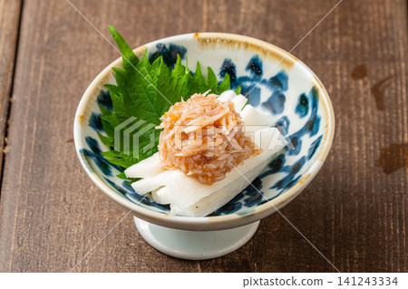 A crunchy snack made with yam and pickled plum. A crunchy snack made with yam and pickled plum. 141243334