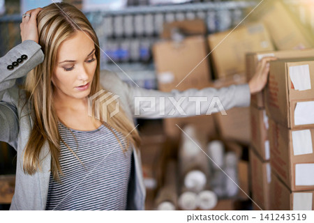 Women, stress and warehouse production with boxes for shipping logistics, inventory or manufacturing. Female person, overworked and headache at packaging wholesale or distribution, supplier or import Women, stress and warehouse production with boxes for shipping logistics, inventory or manufacturing. Female person, overworked and headache at packaging wholesale or distribution, supplier or import 141243519