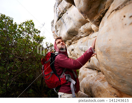 Man, mountain and hiking in nature for fitness, wellness and exercise for training and adventure in environment. Young person with backpack and rock for workout and trekking in morning with tree Man, mountain and hiking in nature for fitness, wellness and exercise for training and adventure in environment. Young person with backpack and rock for workout and trekking in morning with tree 141243615