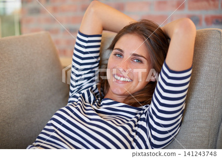 Woman, portrait and smile with lounge, rest and break in apartment living room. Happy lady, sofa and home with happiness, satisfaction and positivity for carefree peace and mental health wellness Woman, portrait and smile with lounge, rest and break in apartment living room. Happy lady, sofa and home with happiness, satisfaction and positivity for carefree peace and mental health wellness 141243748