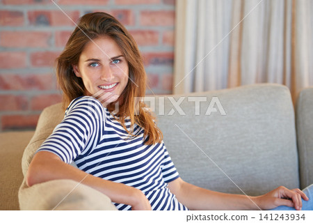 Relax, sofa and portrait of woman in house, home and living room with peace or calm and happy to rest for weekend. Female person, gen z girl and lady in apartment, lounge and sitting on couch Relax, sofa and portrait of woman in house, home and living room with peace or calm and happy to rest for weekend. Female person, gen z girl and lady in apartment, lounge and sitting on couch 141243934