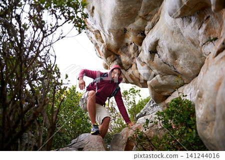 Man, mountain climbing and exercise for adventure outdoor, freedom and journey with travel, focus and strong. Determination, concentration and trekking with challenge, peak and rocks on rough terrain Man, mountain climbing and exercise for adventure outdoor, freedom and journey with travel, focus and strong. Determination, concentration and trekking with challenge, peak and rocks on rough terrain 141244016