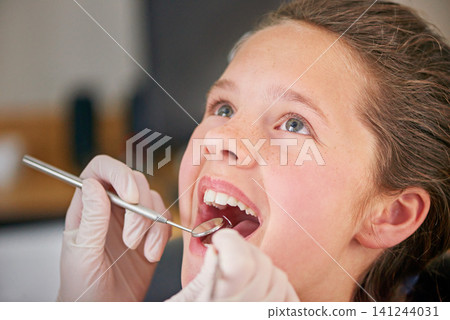 Mirror, hands and dentist with kid for teeth exam, healthcare and orthodontics in clinic. Dental hygiene, child and closeup of medical doctor with tools for patient or pediatrician cleaning mouth Mirror, hands and dentist with kid for teeth exam, healthcare and orthodontics in clinic. Dental hygiene, child and closeup of medical doctor with tools for patient or pediatrician cleaning mouth 141244031