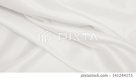 Smooth elegant golden silk or satin luxury cloth texture as wedding background. Luxurious background design. In Sepia toned. Retro style Smooth elegant golden silk or satin luxury cloth texture as wedding background. Luxurious background design. In Sepia toned. Retro style 141244155