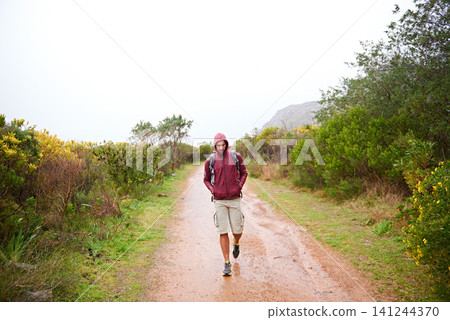 Hiking, man and walking in nature for travel, backpack and outdoor for fresh air and fitness on path for trip. Trekking, mountain trail and terrain for adventure, journey and exercise in environment Hiking, man and walking in nature for travel, backpack and outdoor for fresh air and fitness on path for trip. Trekking, mountain trail and terrain for adventure, journey and exercise in environment 141244370