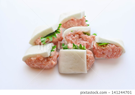 Fish cake stuffed with minced meat and perilla leaves (before cooking) Fish cake stuffed with minced meat and perilla leaves (before cooking) 141244701