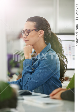 Business woman, thinking and internet with planning in office with idea and graphic design project. Staff, professional and startup with a digital employee at a desk with ux work for company website Business woman, thinking and internet with planning in office with idea and graphic design project. Staff, professional and startup with a digital employee at a desk with ux work for company website 141244754