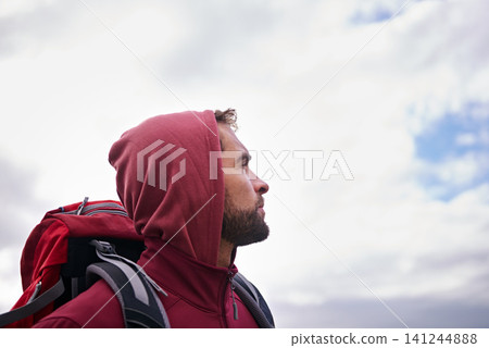 Sky, hiking and man with backpack, thinking and outdoor in nature for adventure, peace and travel. Contemplation, mindfulness and male person looking up, thoughtful and journey for holiday and break Sky, hiking and man with backpack, thinking and outdoor in nature for adventure, peace and travel. Contemplation, mindfulness and male person looking up, thoughtful and journey for holiday and break 141244888