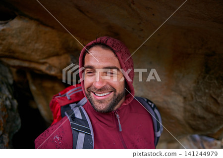 Cave, smile and man hiking in mountain, nature and vacation in holiday, wellness and health. Travel, trekking and male person with pride, happiness and adventure of guy with backpack in trip Cave, smile and man hiking in mountain, nature and vacation in holiday, wellness and health. Travel, trekking and male person with pride, happiness and adventure of guy with backpack in trip 141244979