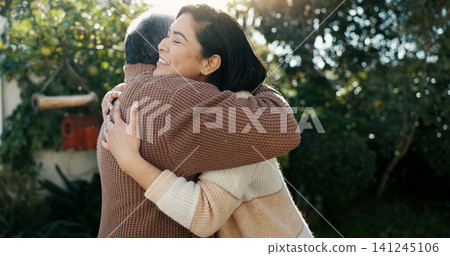 Family, hug and a senior father with his daughter in the garden of a home together for bonding during a visit. Love, smile and retirement with an elderly man embracing a woman outdoor in the backyard Family, hug and a senior father with his daughter in the garden of a home together for bonding during a visit. Love, smile and retirement with an elderly man embracing a woman outdoor in the backyard 141245106