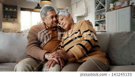 Senior, couple and hug for empathy on sofa with support, grief and comfort in living room of house. Old people, man and woman with love and embrace for security, compassion and sympathy on couch Senior, couple and hug for empathy on sofa with support, grief and comfort in living room of house. Old people, man and woman with love and embrace for security, compassion and sympathy on couch 141245133