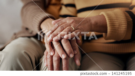 Senior, couple and hands for empathy on sofa with support, grief and comfort in living room of house. Old people, man and woman with love and embrace for security, compassion and sympathy on couch Senior, couple and hands for empathy on sofa with support, grief and comfort in living room of house. Old people, man and woman with love and embrace for security, compassion and sympathy on couch 141245195