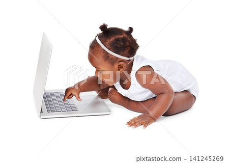 African, baby girl in studio with laptop in portrait, curious or play with computer. Female child on backdrop with technology for video learning, amusement or development, milestones in Cape Town 141245269