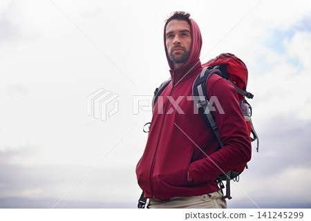 Sky, thinking and man with backpack, camping or hiking in nature for adventure and peace. Contemplation, vacation and male person in trip, thoughtful and journey for holiday and outdoor for relax Sky, thinking and man with backpack, camping or hiking in nature for adventure and peace. Contemplation, vacation and male person in trip, thoughtful and journey for holiday and outdoor for relax 141245299