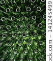Abstract background of green glass bottles. Concept of glass recycling, reusable bottles, circular economy, bottle deposit return system (Pfand) and sustainable waste management. 141245499