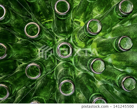 Abstract background of green glass bottles. Concept of glass recycling, reusable bottles, circular economy, bottle deposit return system (Pfand) and sustainable waste management. 141245500