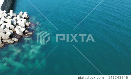 Drone aerial photography showing the crystal-clear waters at the mouth of the Kannai River in Yakumo Town, Hokkaido. Drone aerial photography showing the crystal-clear waters at the mouth of the Kannai River in Yakumo Town, Hokkaido. 141245546